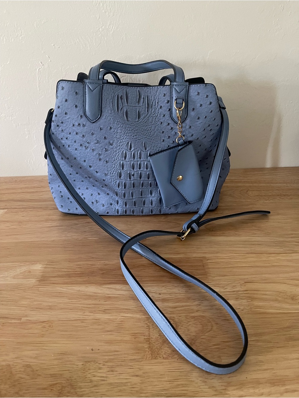 Blue ostrich embossed satchel crossbody handbag with matching coin pouch
